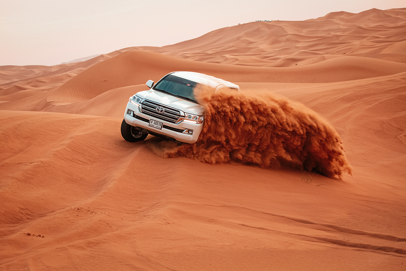  Car Driving on Sand Dunes